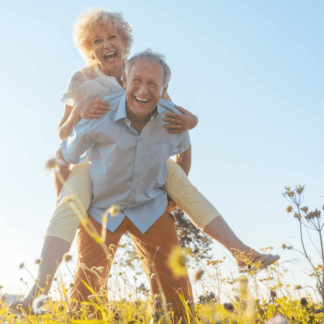 Person smiling peacefully, surrounded by natural elements and herbs